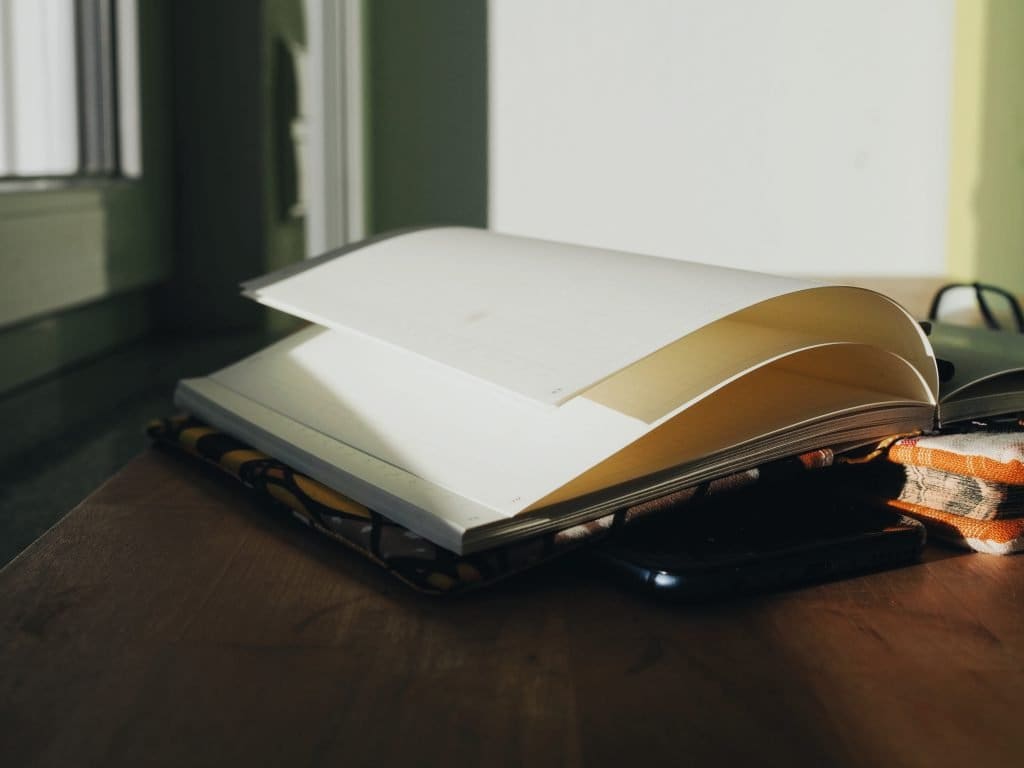 An open notebook. It is blank.